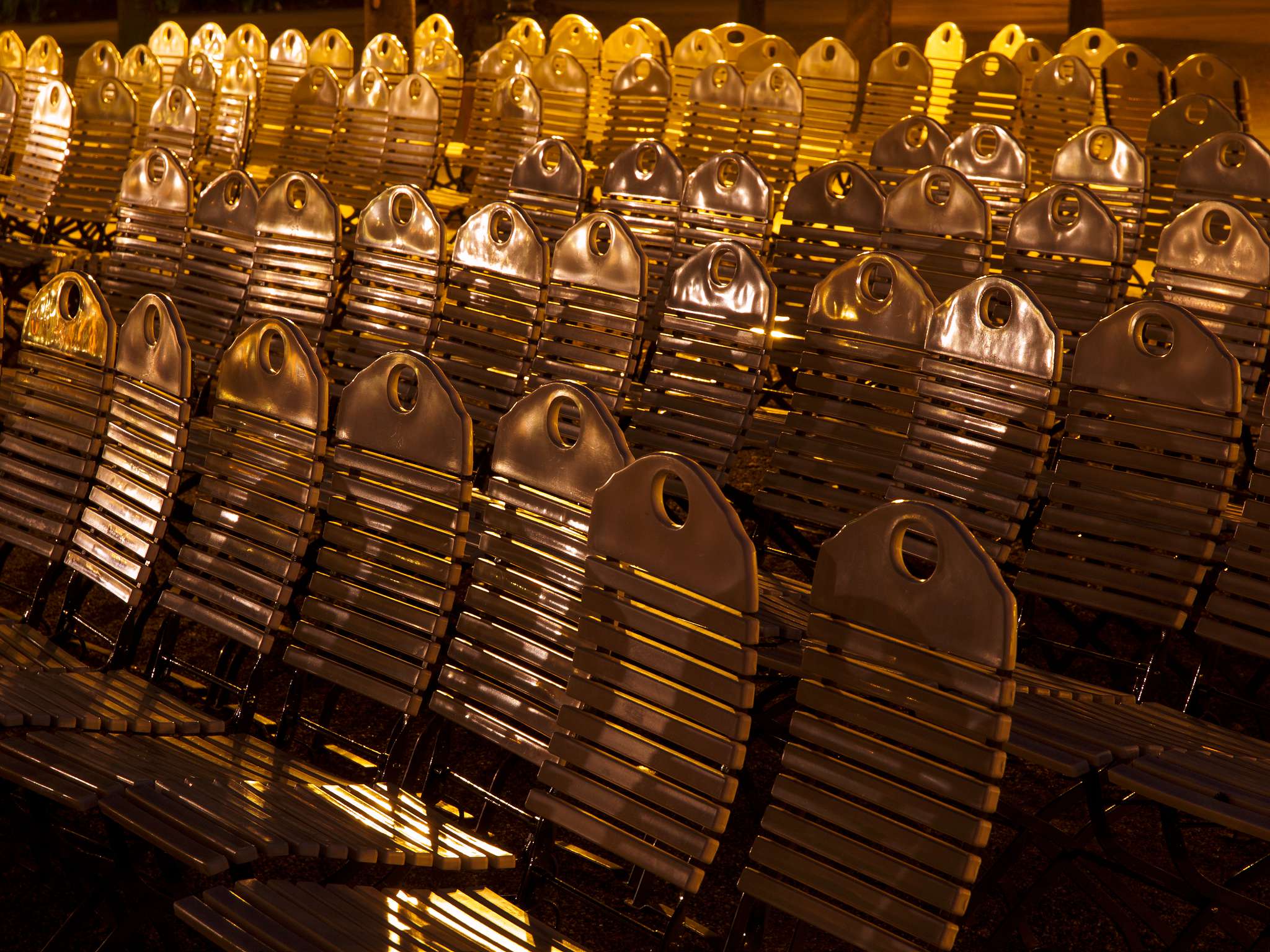Shimmering Night Light on Chairs, Waiting for the Next Performance