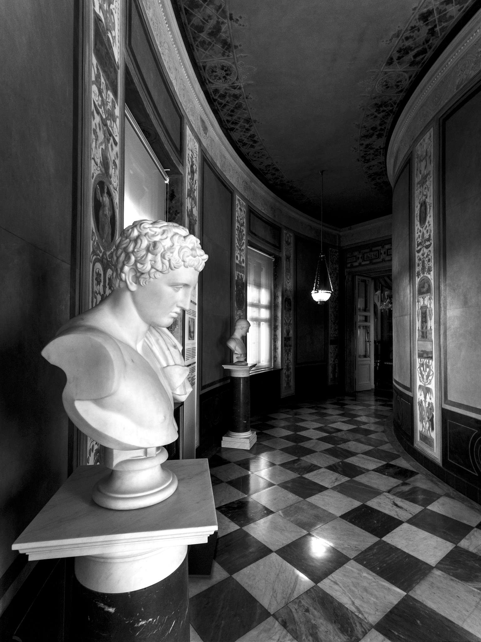 Men Staring into the Corridor